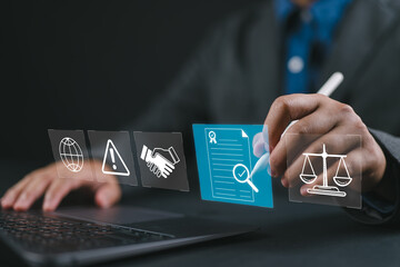 Compliance in business concept. Person use laptop with compliance icon on virtual screen, ensuring...