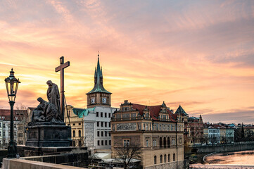 Prague at sunrise over the famous Charles Bridge with a panoramic view of the Bedrich Smetana...