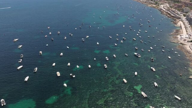 Boats Moored On The Habour Of Saint Paul's Bay In Malta. Aerial Shot