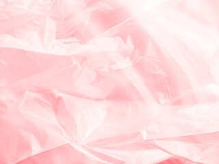 Fototapeta premium Abstract background plastic bag pink vacuum cling foil wrinkle texture wall crumpled film foil overlay seal wrap polyethyene packaging frame material industry wrinkle template ecosystem environment