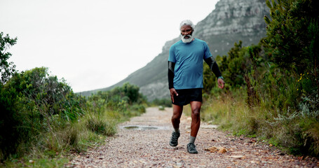 Hip pain, senior black man and injury in nature for fitness, workout or training with accident....