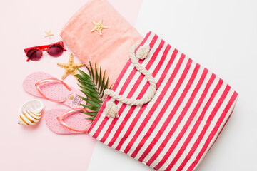 Composition with stylish beach accessories on colored background, top view. Beach fashion flat lay, summer concept. Trendy colors