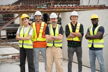 Portrait mature Caucasian engineer man with Multi-ethnic Team engineer or team labor at precast cement outdoor factory	