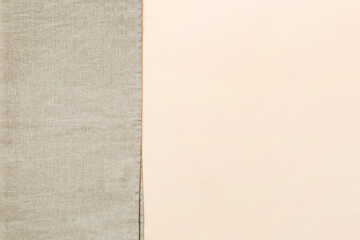 top view with gray kitchen napkin isolated on table background. Folded cloth for mockup with copy space, Flat lay. Minimal style