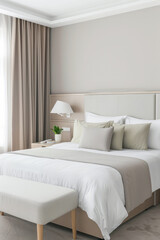 Fototapeta premium Elegant hotel room with stylish furniture, natural colors and neutral lighting. Hotel interiors decor composition.