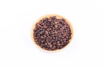 Coffee beans in a wooden bowl on a white background