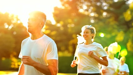 group of people participating in a charity walkathon in a park, early morning sunlight, wearing matching t-shirts, community event, healthy lifestyle, with copy space,