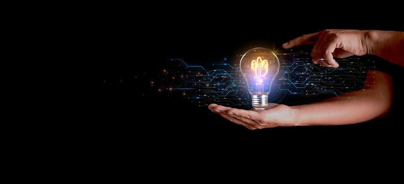Solution or creative idea for designing a web banner or landing page for an innovative company with a hand sticking out of the screen with a light bulb. Famous abstract geometric shapes and lead lines