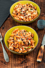 Pasta with shrimps and mussels, traditional Italian food.