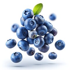 Close-up of fresh blueberries floating against a white background