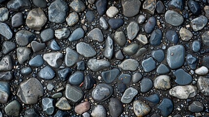 A close up of a rocky surface with many different sized rocks