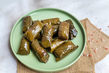 Delicious dolmades , grape leaves stuffed with rice .Greek cuisine 