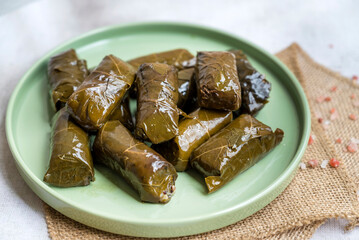Delicious dolmades , grape leaves stuffed with rice .Greek cuisine 