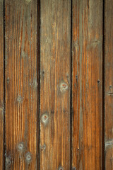 Fototapeta premium Rustic wooden planks texture with visible grain patterns and knots.