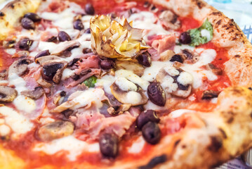 Italian capricciosa  pizza with artichokes  .Close up 