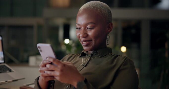 Night, smile and black woman with phone in office for company, planning and digital communication. Happy, finance broker and laughing with tech at desk for investment update, email and joke to client