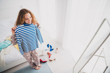 Full body high angle view portrait of nice young girl fitting sweater mirror wear pajama bright interior bedroom flat indoors