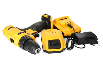 Modern cordless electric drill, charger and battery isolated on white