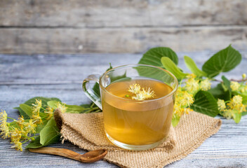 Glass cup of linden tea 