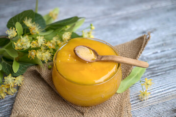 Linden Honey on wooden background