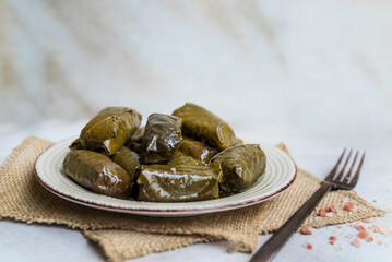 Delicious dolmades , grape leaves stuffed with rice .Greek cuisine 