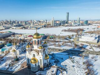 Winter Yekaterinburg and Temple on Blood in beautiful cloudy sunset. Aerial view of Yekaterinburg,...