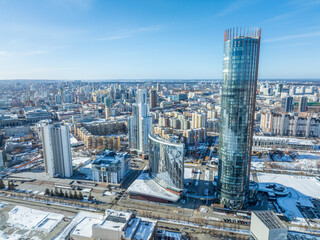 Obraz premium Yekaterinburg aerial panoramic view in Winter at sunset. Yekaterinburg city and pond in winter.