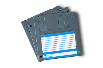 Top view pile of old gray floppy disk isolated on white background with clipping path.