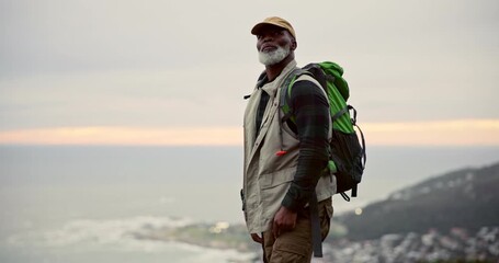 Senior, black man and hiking on mountain outdoor for nature view with travel adventure, backpack and fitness journey. Elderly, person and horizon morning for trekking break, wellness and retirement