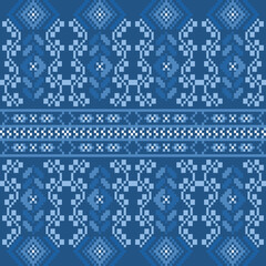 Ethnic geometric fabric pattern Cross Stitch. Pixel pattern blue background. Abstract, vector, illustration, Texture, clothing, frame, decoration, motifs, silk, wallpaper.