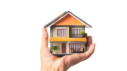Hand holding a model house on transparent background