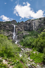 Shdugra waterfall with neighbour waterfalls near Village Mazeri, Svaneti. Expedition in Forest nearby Ushba Mountain.Shdugra waterfall near Mazeri, Georgia.
