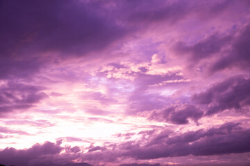 Dreamy purple sky background and sunlight with copy space