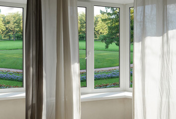 View from the window, green trees, landscape with flower.      
