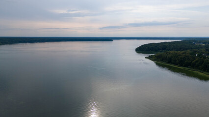 Drone photography of forest and lake during summer day