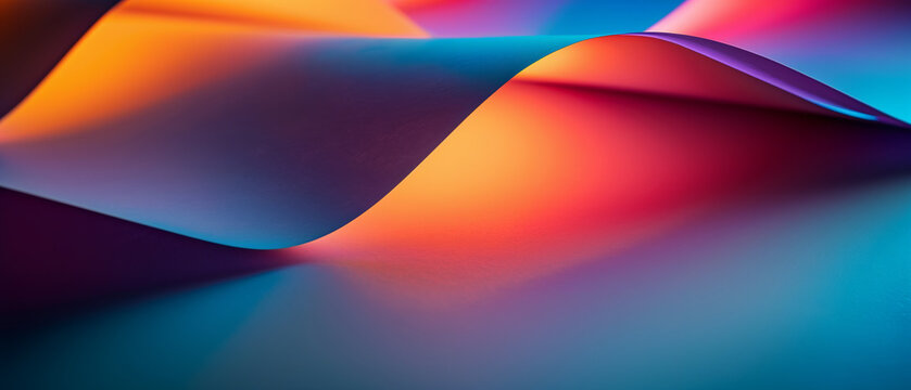 Vibrant, colorful abstract photograph showcasing a dynamic, folded paper with gradients of orange, purple, and blue light