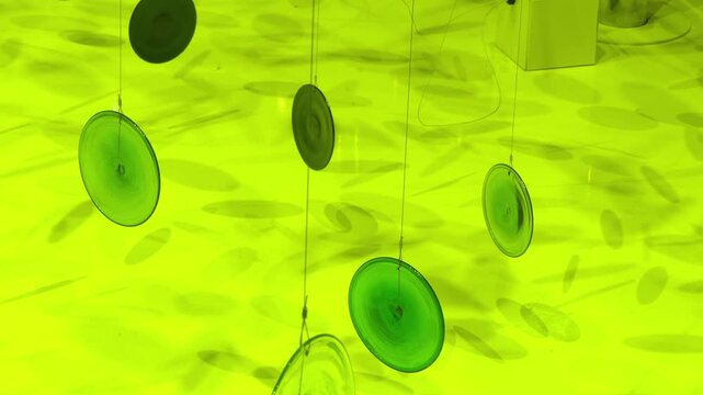 IFA, BERLIN - September 7 2016: Pavilion Samsung AT Ifa Global Markets in Berlin, Messe, Germany. Plastic discs hang on the ropes and rotate.