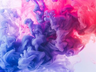 Fototapeta premium Abstract swirling pink and blue ink in water.