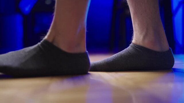 Flat feet while walking over the frame in slow motion 4K