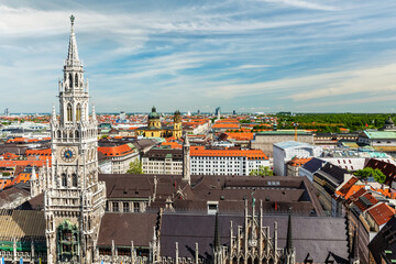 Obraz premium View of Munich Marienplatz, Neues Rathaus and Frauenkirche from St. Peter's church. Munich, Germany
