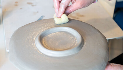 Fototapeta premium shape clay with hands 