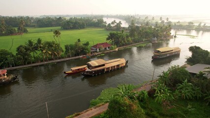 Houseboat Cruises Along Canals In Alleppey, Aerial View, Kerala, India. Houseboats in backwaters Alleppey. Travel, Vacation concept