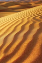 Close up of a vast desert landscape, showcasing detailed ripples and waves in the sand created by the wind