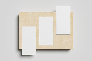 Perfect blank DL flyer brochure on wooden board.