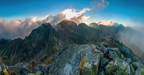 Early morning in High Tatras mountains, Slovakia. An amazing view of high rocky peaks surrounded by...