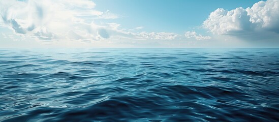 Infinite expanse of water stretching into the horizon featuring a serene backdrop with abundant copy space image