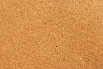 A sheet of brown recycled cardboard texture as background