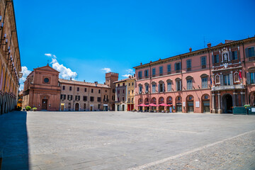 Obraz premium A view from the corner across the Matteotti Square in Imola, Italy in summertime