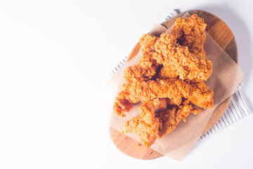 Crispy fried chicken breast strips with sauce