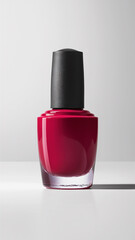 image of a smooth, shiny bottle of red nail polish
